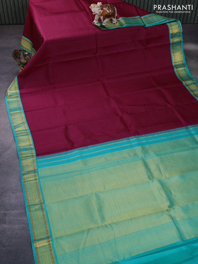 Pure kanchipuram silk saree dark pink and green with plain body and zari woven korvai border