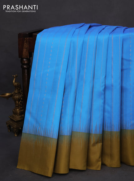 Pure kanchipuram silk saree cs blue and mehendi green with allover zari weaves and simple border