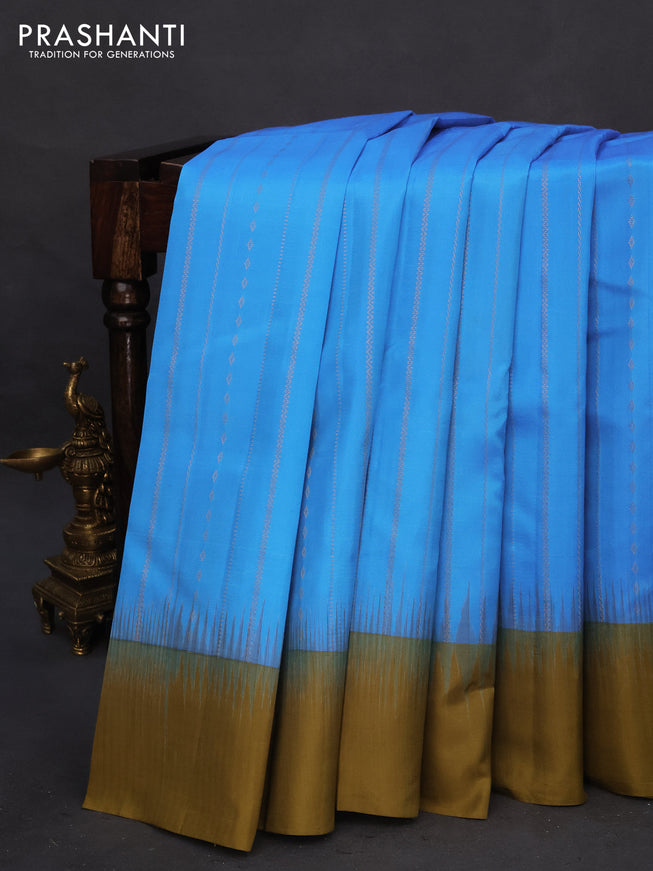 Pure kanchipuram silk saree cs blue and mehendi green with allover zari weaves and simple border