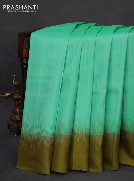 Pure kanchipuram silk saree teal green and mehendi green with allover zari weaves and simple border