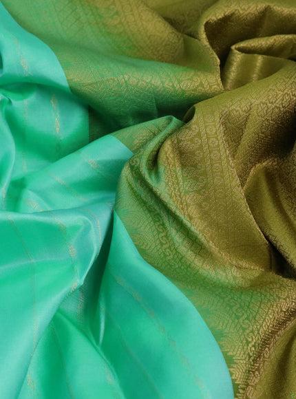 Pure kanchipuram silk saree teal green and mehendi green with allover zari weaves and simple border