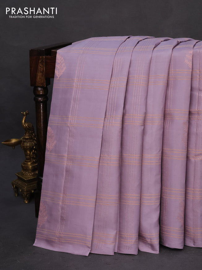 Pure kanchipuram silk saree pastel grey and mauve pink with allover zari checks & buttas in borderless style