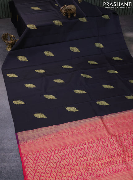 Pure kanchipuram silk saree black and dual shade of pinkish orange with zari woven buttas and piping border