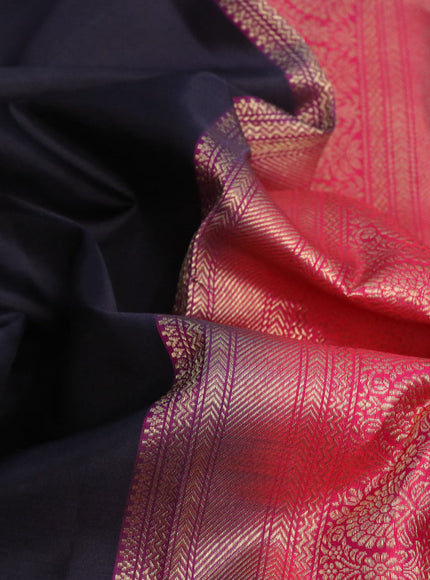 Pure kanchipuram silk saree black and dual shade of pinkish orange with zari woven buttas and piping border