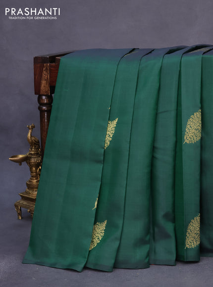 Pure kanchipuram silk saree green and dual shade of pinkish orange with zari woven buttas and piping border