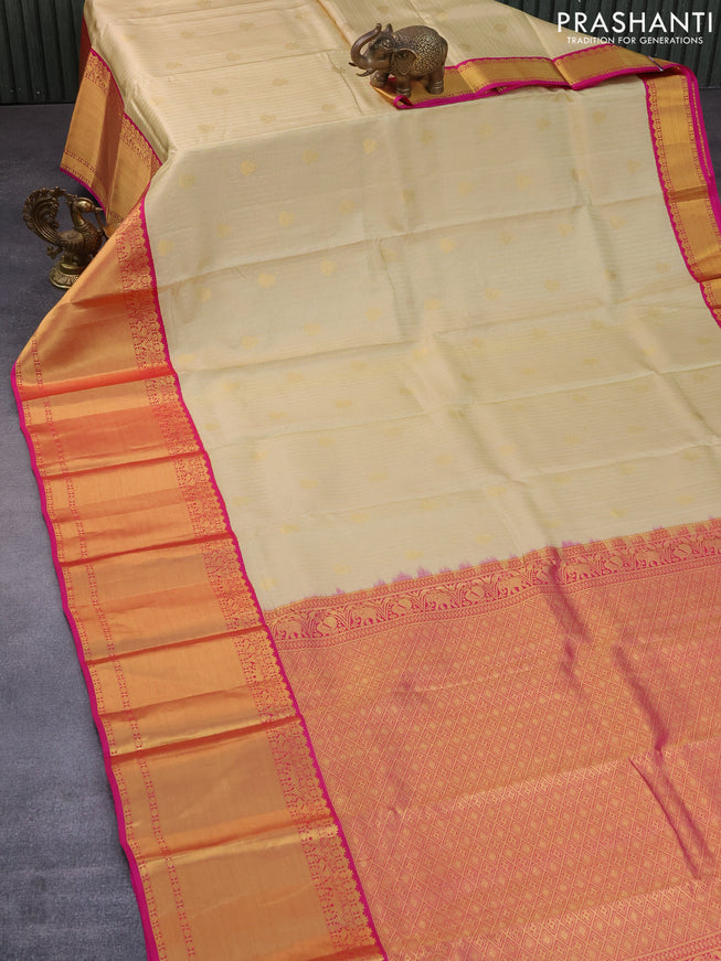 Pure kanchipuram silk saree sandal and pink with allover zari checks & buttas and long zari woven korvai border