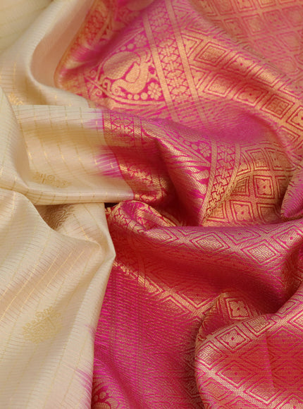 Pure kanchipuram silk saree sandal and pink with allover zari checks & buttas and long zari woven korvai border