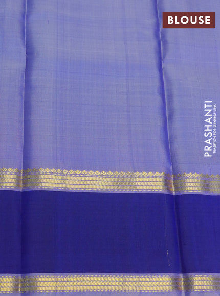 Pure kanchipuram silk saree blue shade and blue with allover checked pattern and rettapet zari woven border