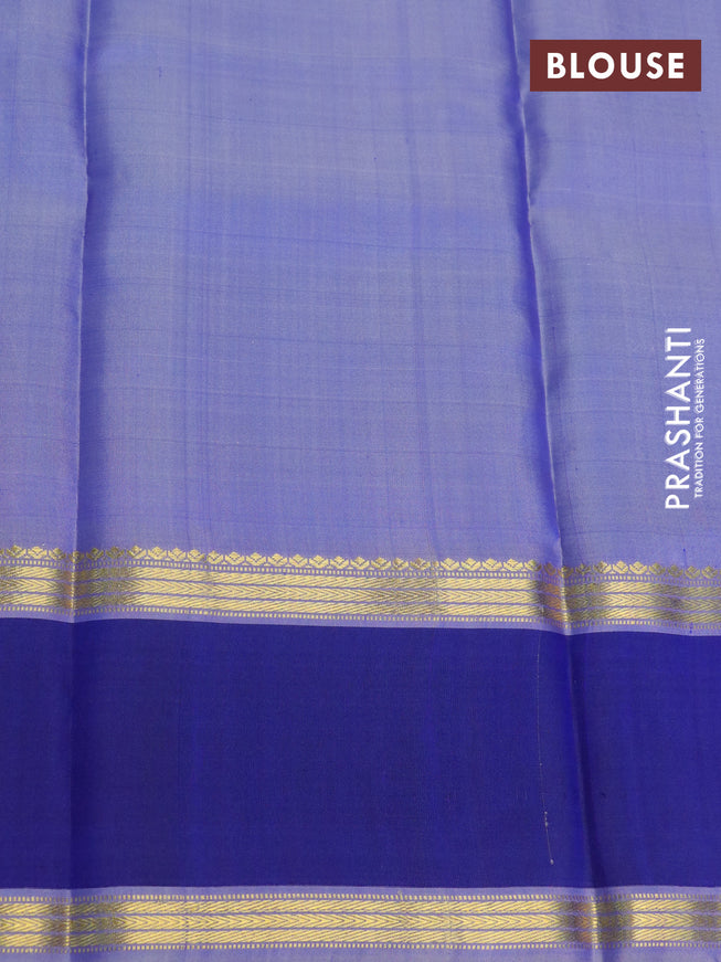 Pure kanchipuram silk saree blue shade and blue with allover checked pattern and rettapet zari woven border