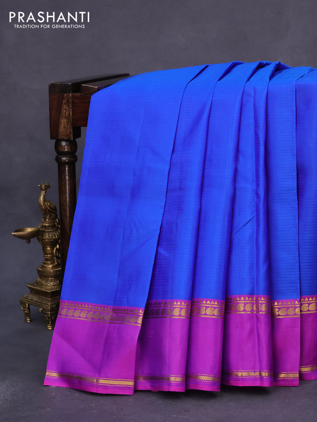 Pure kanchipuram silk saree blue with allover stripes pattern and ganga jamuna border