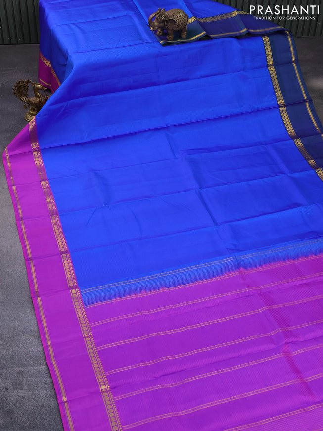 Pure kanchipuram silk saree blue with allover stripes pattern and ganga jamuna border