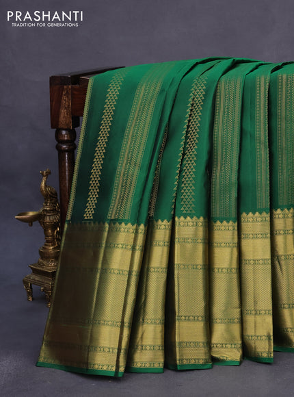 Pure kanchipuram silk saree green and light pink with allover zari weaves and long zari woven border