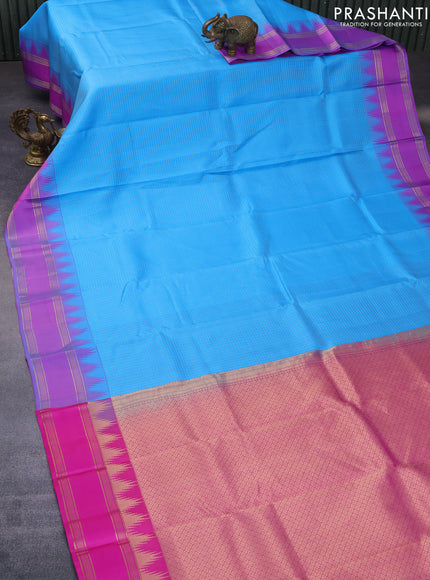 Pure kanchipuram silk saree light blue and pink with allover small zari checked pattern and temple deisgn rettapet zari woven border