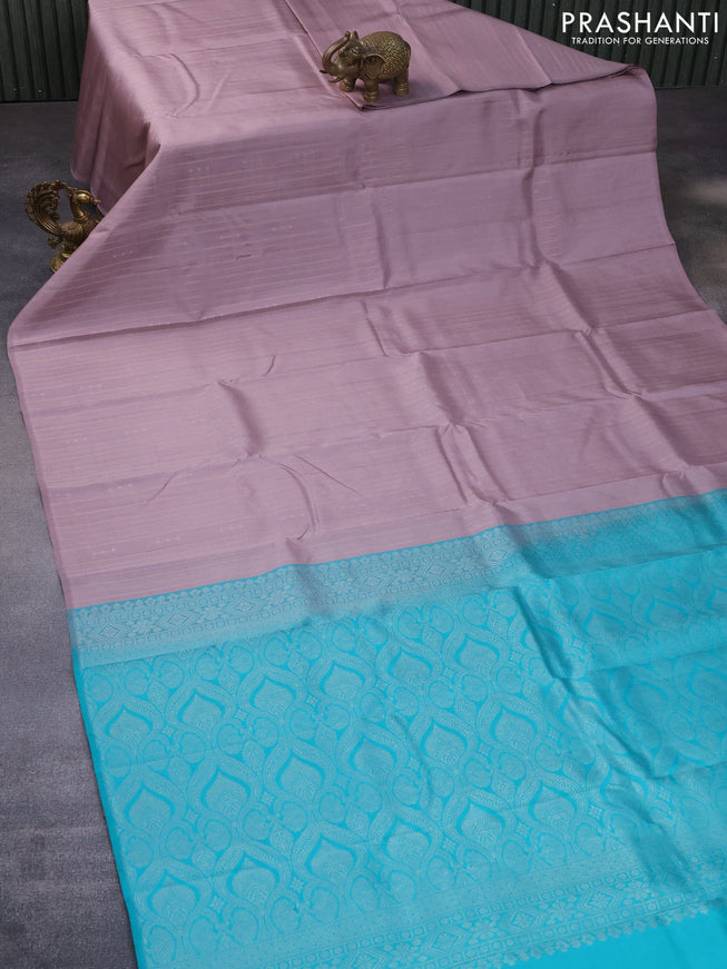 Pure kanchipuram silk saree grey and teal blue with allover zari weaves & buttas in borderless style