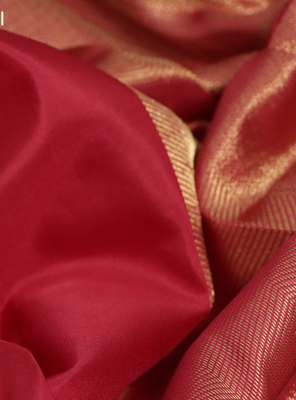 Pure kanchipuram silk saree red with plain body and temple deisgn zari woven border