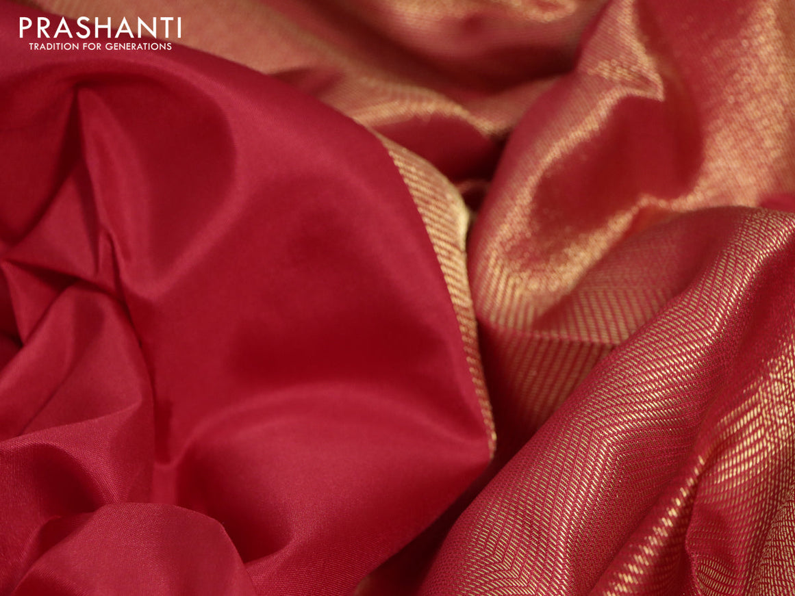 Pure kanchipuram silk saree red with plain body and temple deisgn zari woven border