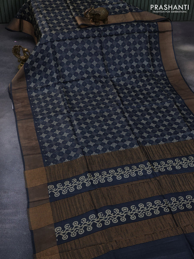 Pure tussar silk saree elephant grey with allover prints and zari woven border