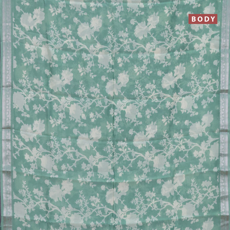 Chanderi silk cotton saree pastel green with allover floral prints and zari woven border