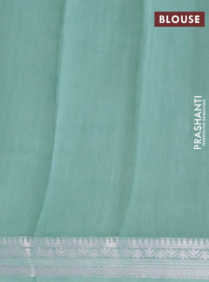 Chanderi silk cotton saree pastel green with allover floral prints and zari woven border