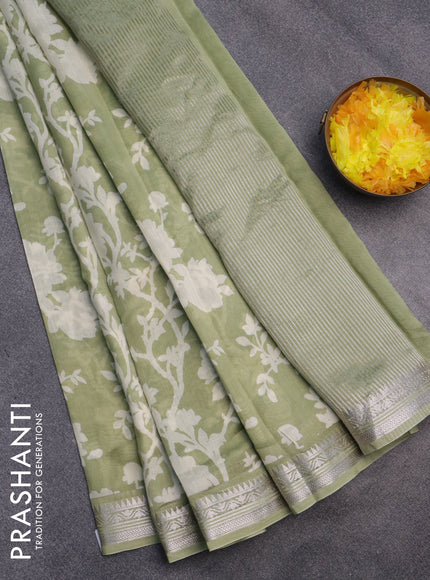 Chanderi silk cotton saree pista green with allover floral prints and zari woven border