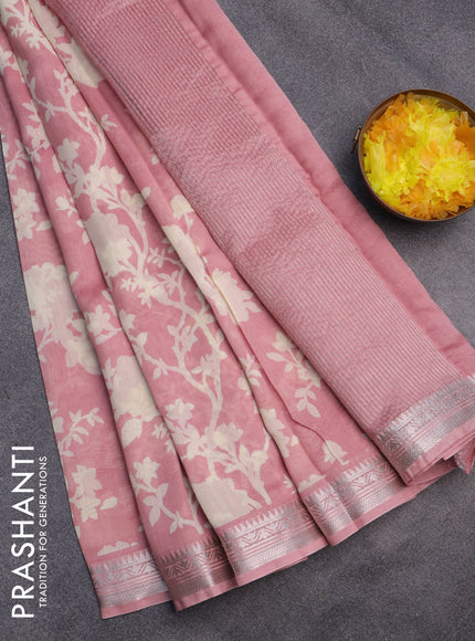 Chanderi silk cotton saree peach pink with allover floral prints and zari woven border