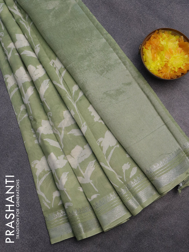 Chanderi silk cotton saree pastel green with allover floral prints and silver zari woven border