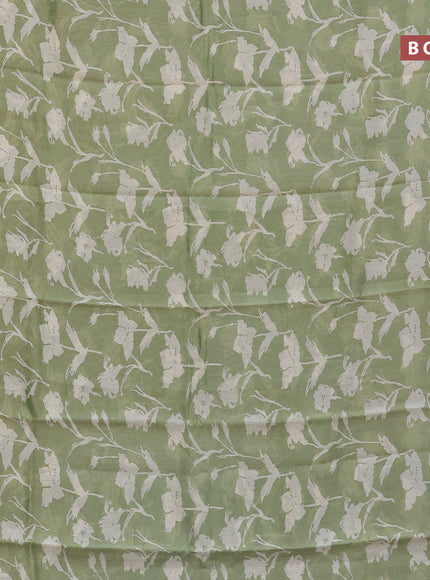 Chanderi silk cotton saree pastel green with allover floral prints and silver zari woven border