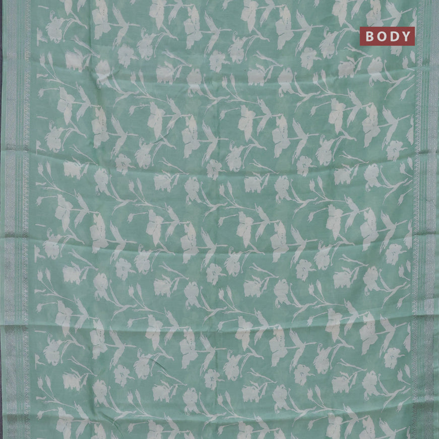 Chanderi silk cotton saree pastel green with allover floral prints and silver zari woven border