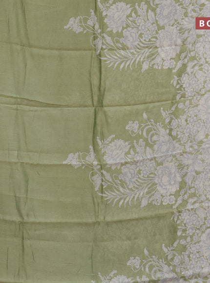 Chanderi silk cotton saree pista green with allover floral prints and zari woven border