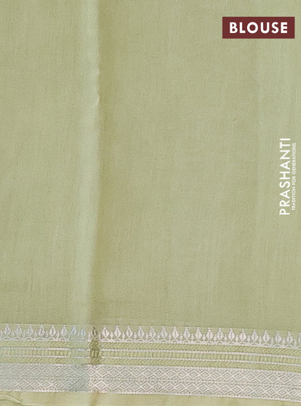 Chanderi silk cotton saree pista green with allover floral prints and zari woven border