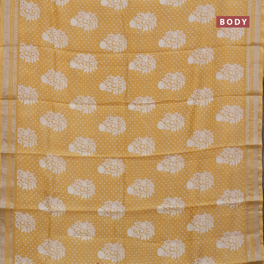 Chanderi silk cotton saree mustard yellow with allover floral prints and silver zari woven border