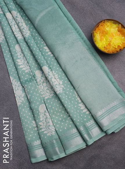 Chanderi silk cotton saree pastel green with allover floral prints and silver zari woven border