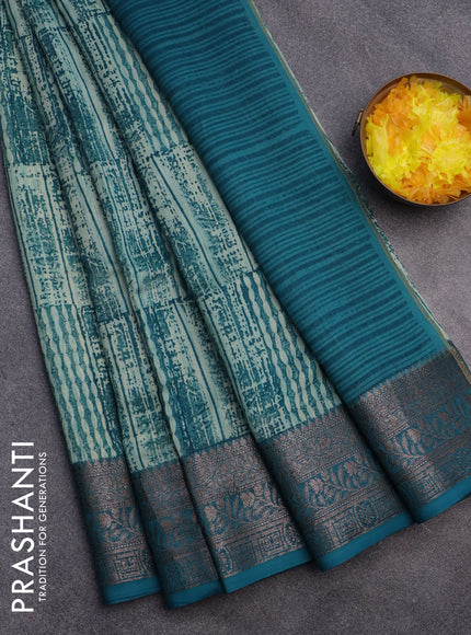 Chanderi silk cotton saree teal blue with allover prints and woven border