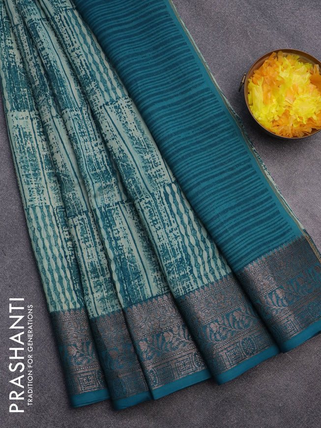 Chanderi silk cotton saree teal blue with allover prints and woven border