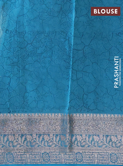 Chanderi silk cotton saree teal blue with allover prints and woven border