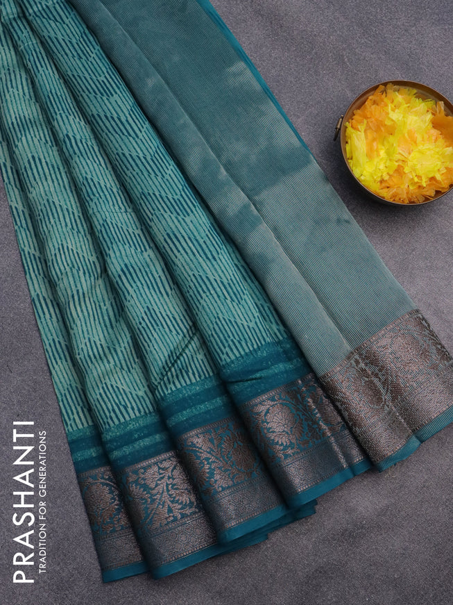 Chanderi silk cotton saree teal blue with allover geometric prints and woven border