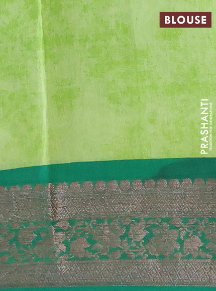 Chanderi silk cotton saree light green and green with allover floral prints and banarasi style border