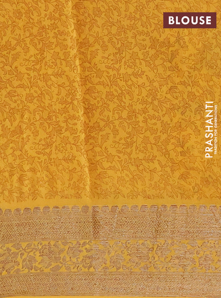 Chanderi silk cotton saree mustard yellow with allover kalamkari prints and banarasi style border