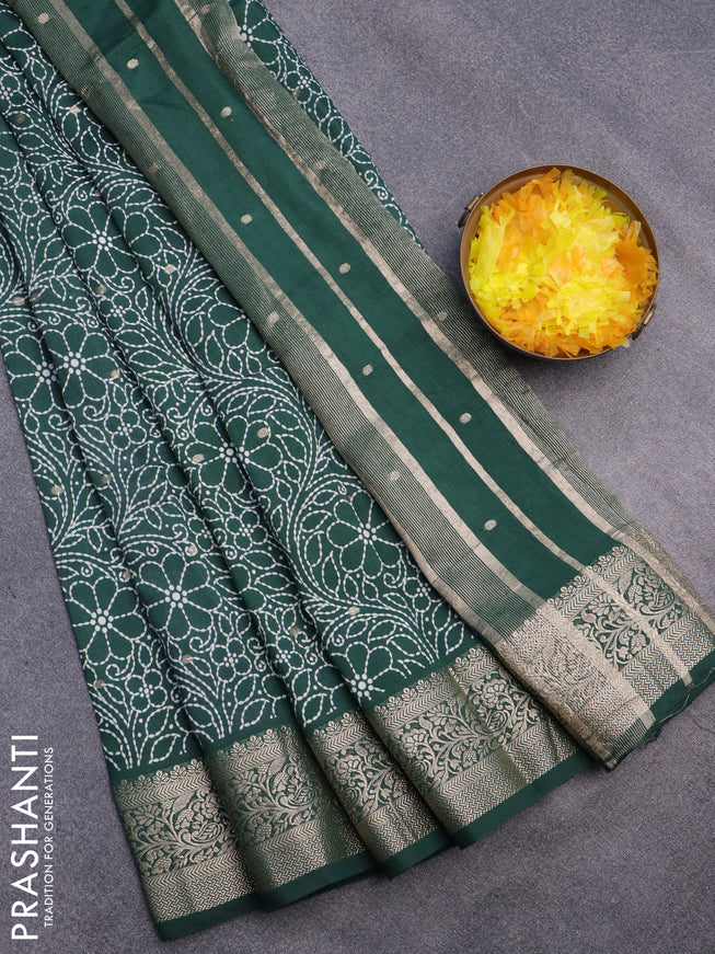 Assam silk saree dark green with allover floral prints & zari buttas and zari woven border