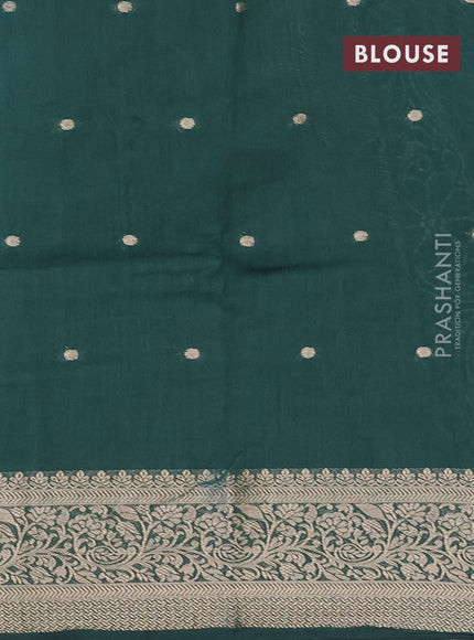 Assam silk saree dark green with allover floral prints & zari buttas and zari woven border