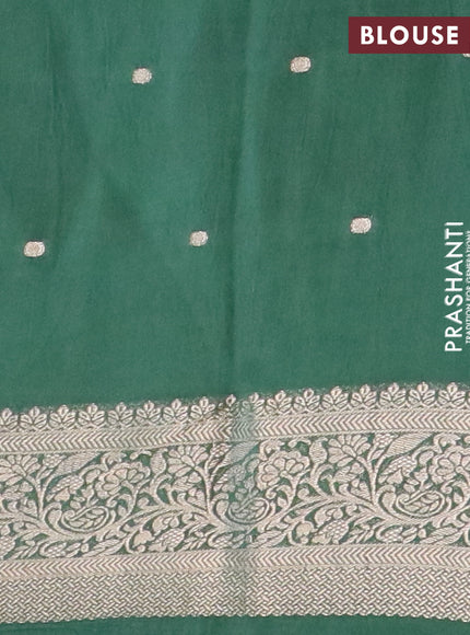 Assam silk saree green with allover floral prints & zari buttas and zari woven border