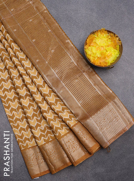 Assam silk saree mustard yellow with allover ikat prints & zari buttas and zari woven border