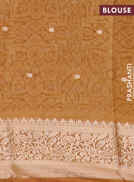 Assam silk saree mustard yellow with allover ikat prints & zari buttas and zari woven border