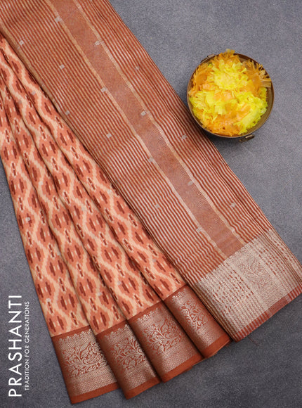 Assam silk saree pale orange and rust shade with allover ikat prints & zari buttas and zari woven border