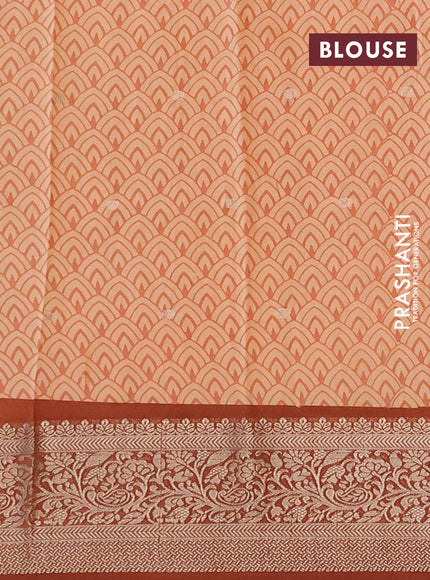 Assam silk saree pale orange and rust shade with allover ikat prints & zari buttas and zari woven border