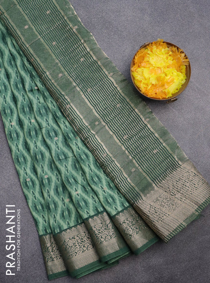 Assam silk saree green shade with allover ikat prints & zari buttas and zari woven border