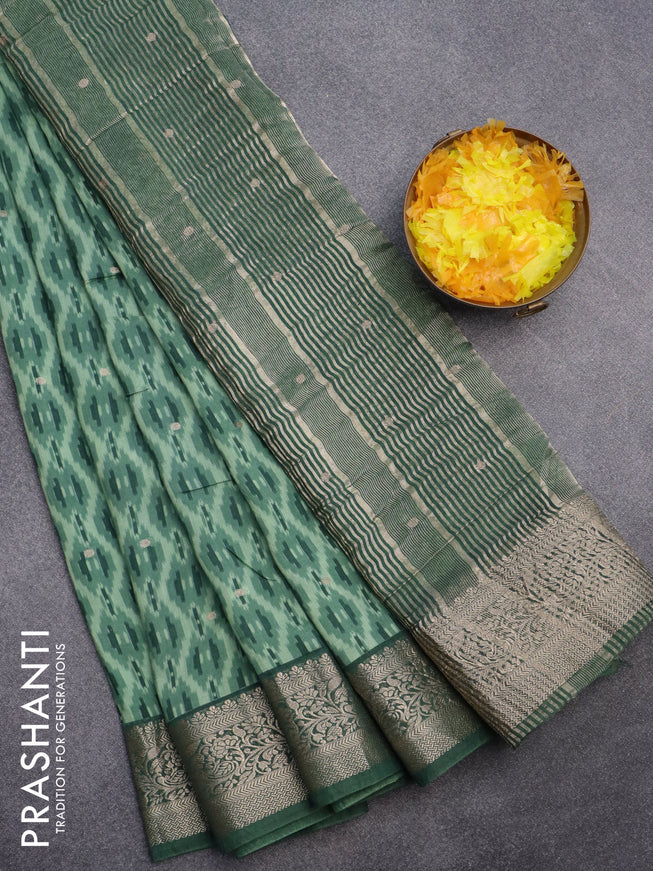 Assam silk saree green shade with allover ikat prints & zari buttas and zari woven border