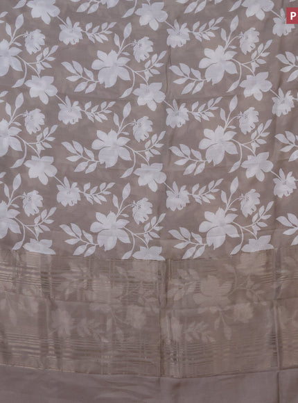 Assam silk saree grey shade with allover floral prints and zari woven border