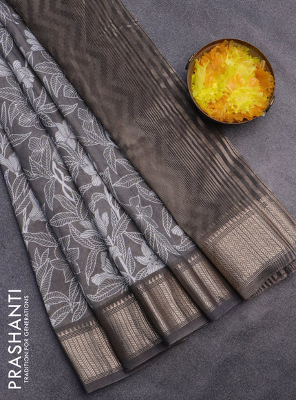 Assam silk saree grey shade with allover prints and zari woven border