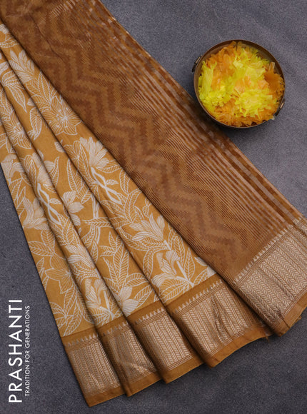 Assam silk saree mustard yellow with allover prints and zari woven border